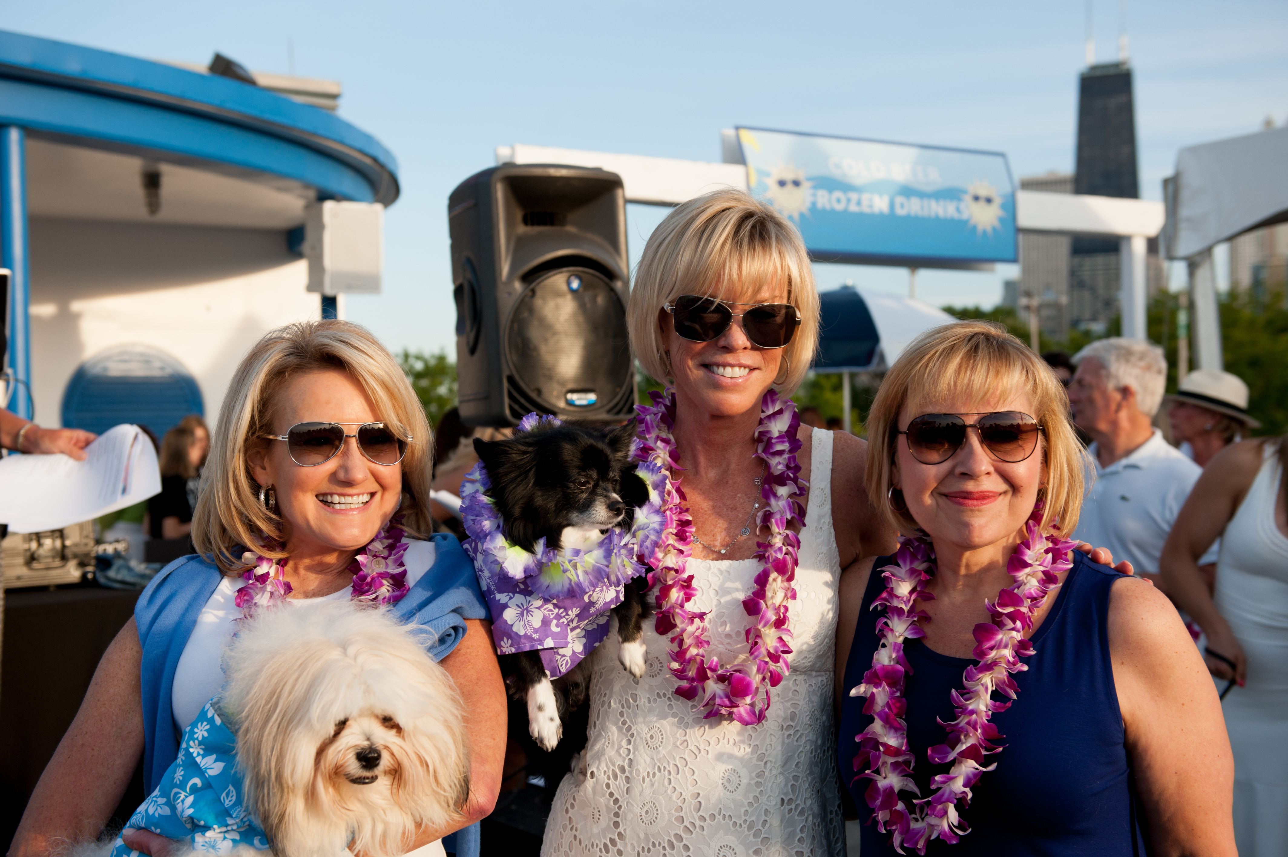 2014 Beach Party Co Chairs Kimberly Gleeson Cheri Lawrence Christine Mallul with dogs Spencer Bentley